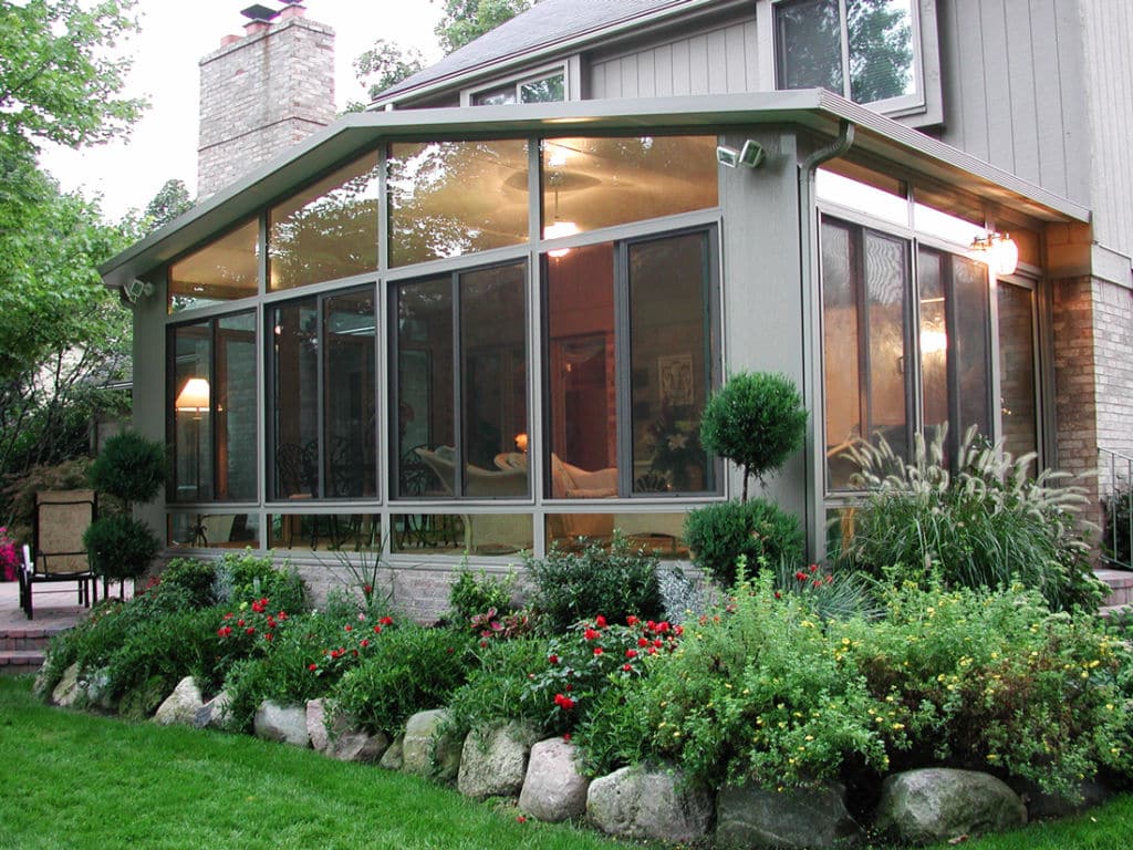 Enclosed sunroom, for a covered backyard experience. 