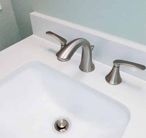 spreadfit sink faucet with the handles spread apart as separate pieces. 
