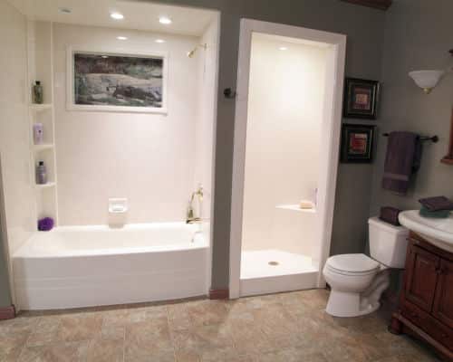 Remodeling your bathroom for resale: Bathroom remodel with a bathtub and shower, the two share a wall. Keeping the bathtub adds resale value. 