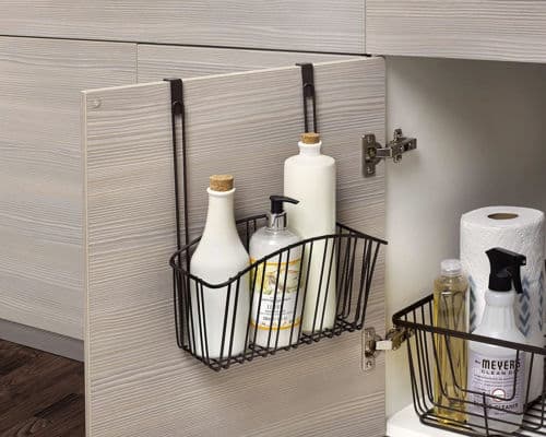 A bathroom cabinet rack, hanging on the inside of the vanity door. 