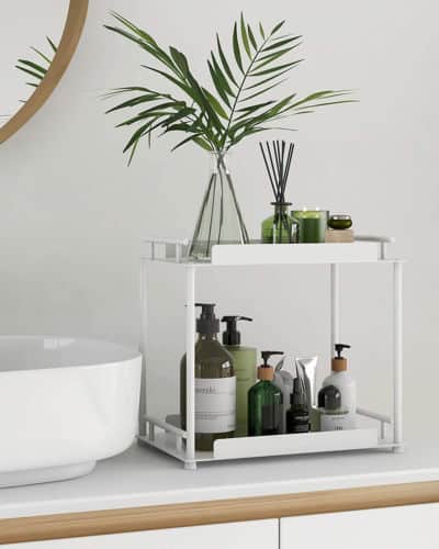 A 2-tiered sink counter rack for storing soap, toothpaste, oils, and other bathroom items, 
