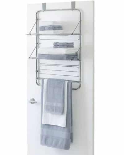 Easy Bathroom Storage Idea: A rack hanging on the bathroom door with shelves and a towel bar. 