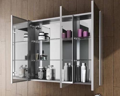 A bathroom medicine cabinet with three openings for ample storage. 