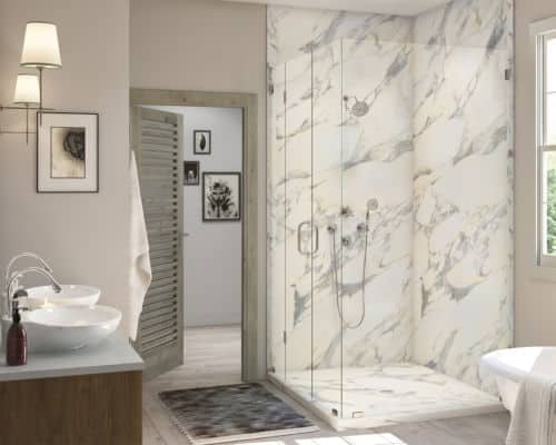 Marble Bathroom: A walk in shower with calcutta gold patterned walls