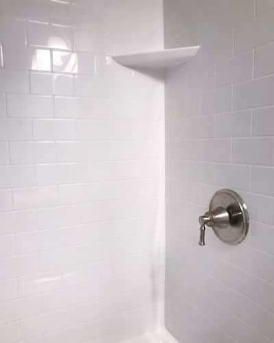 Benefits of SimTile: Plain White SimTile covering shower walls.