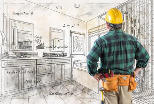 Mentally Prepare for Your Bathroom Remodel: Contractor With Hard Hat and Tool Belt Facing Custom Master Bathroom Design Drawing Details .