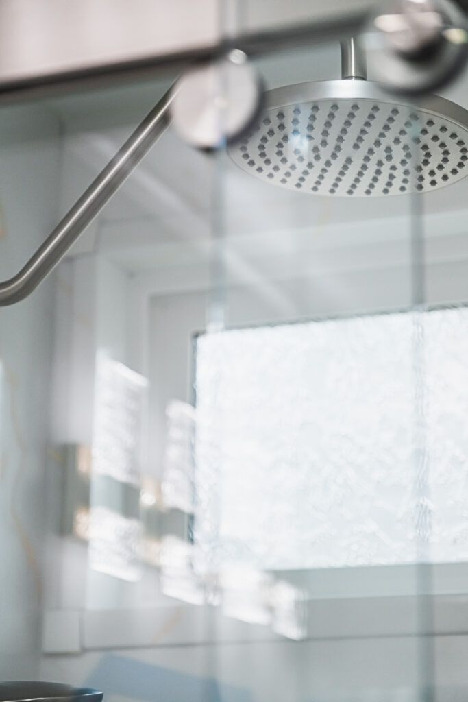 Bathroom Remodel Shower fixture and sliding barn door track